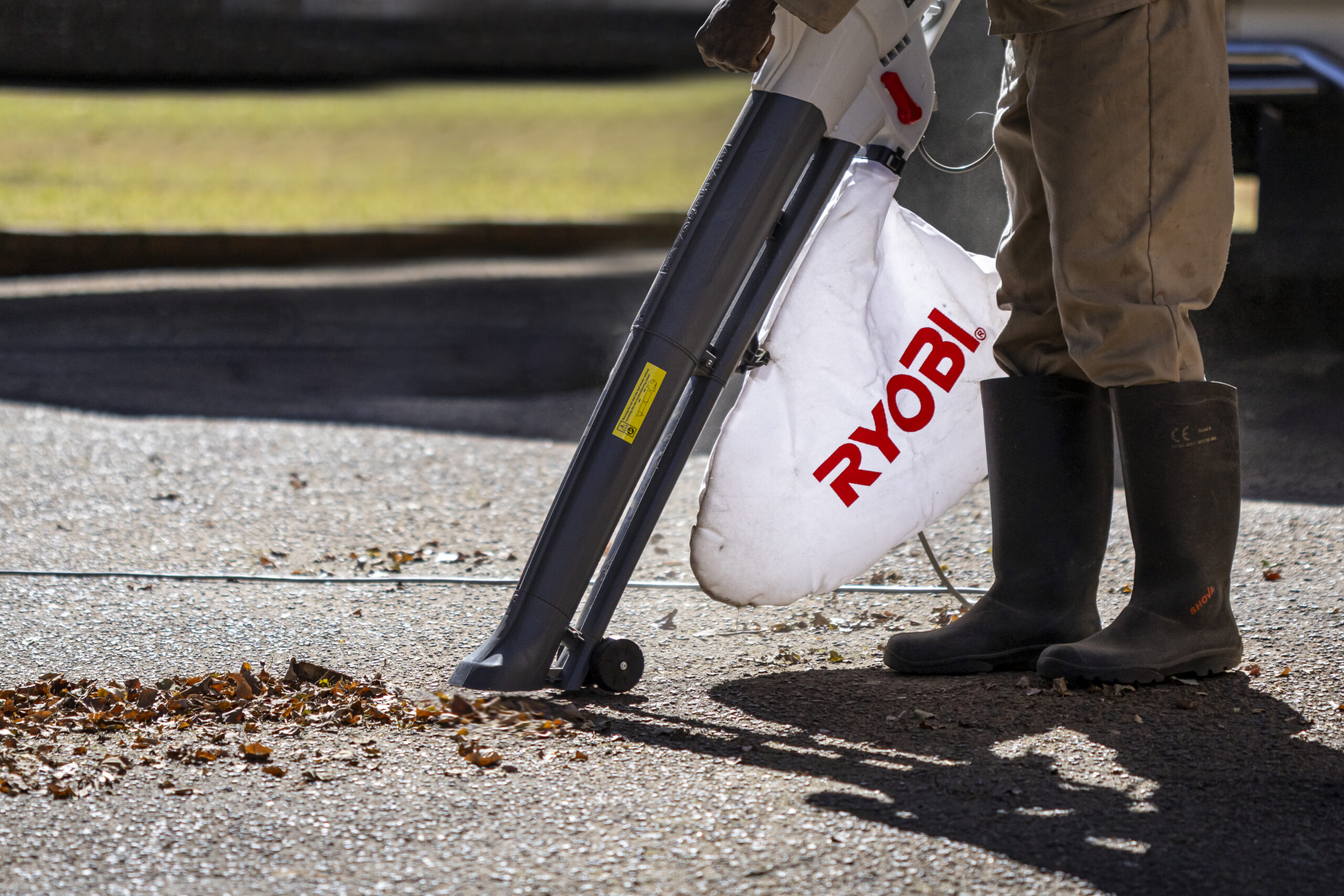Summer Lawn Care Tips - Blower Vacuum in Use